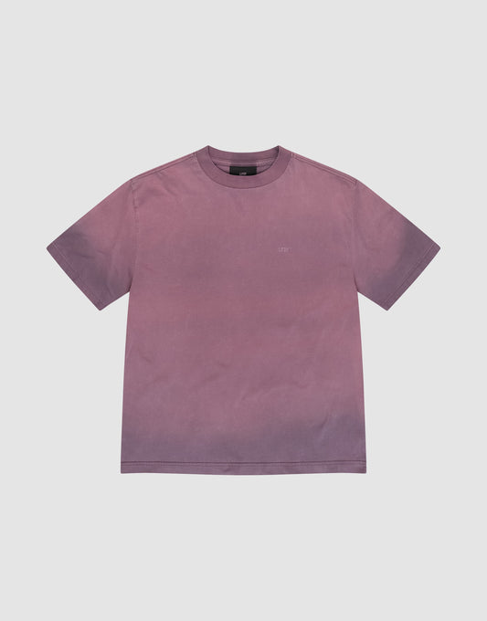 The Live Fast District Tee by LIVE FAST DIE YOUNG is an oversize, short-sleeve crew neck t-shirt in faded mauve-purple with a subtle spray Effekt gradient, shown plain and laid flat on a white background.