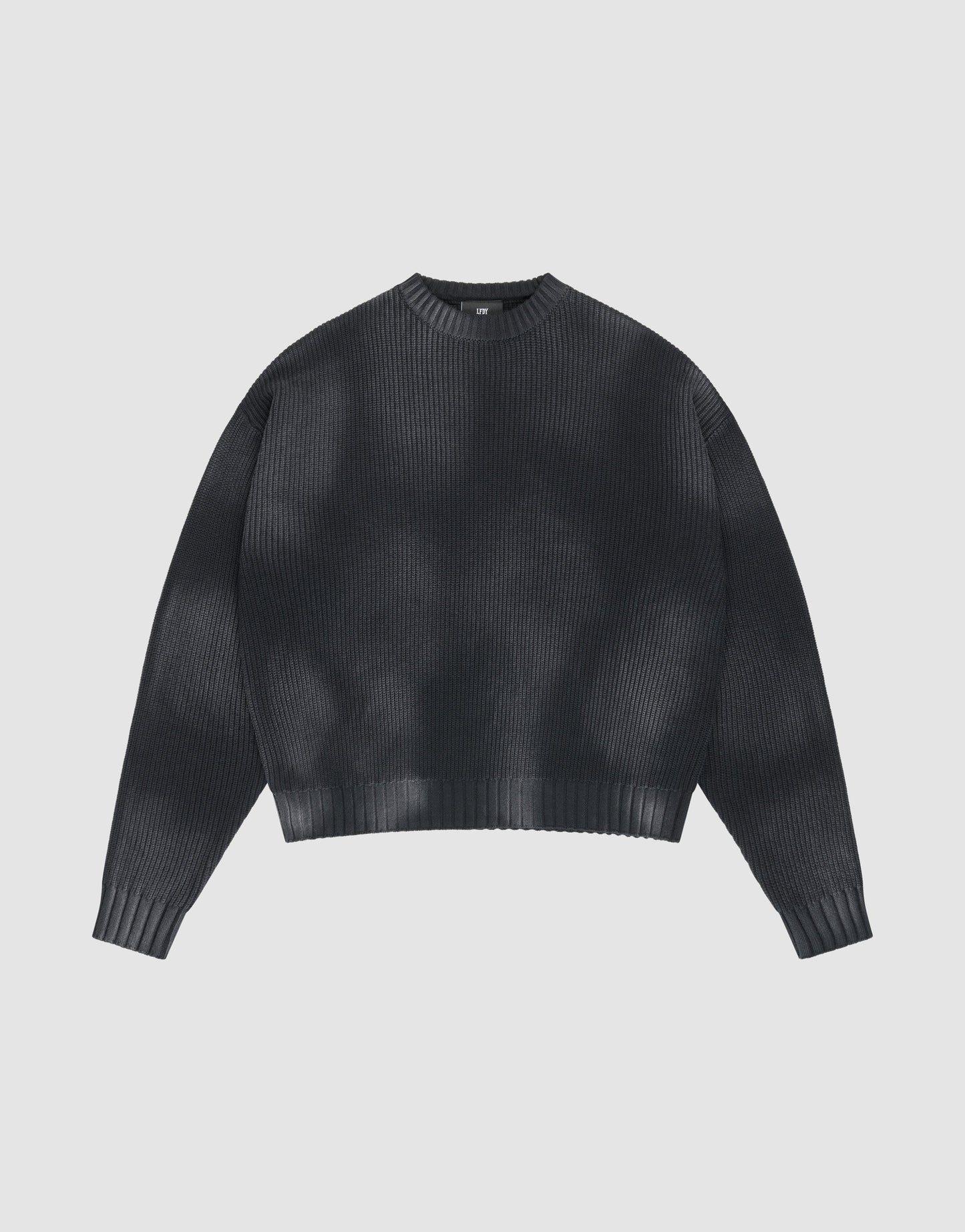 The LFDY Washed Knit Sweater by LIVE FAST DIE YOUNG is a dark gray, ribbed, crew neck sweater with long wide sleeves, a slightly cropped oversize fit, and is made from 100% Baumwolle for comfort.