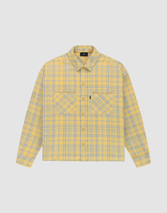 The LIVE FAST DIE YOUNG Vintage Flannel is a yellow and gray plaid oversize long-sleeve button-up shirt with two chest pockets featuring diagonal plaid, a collar, and is shown on a plain white background. | plain