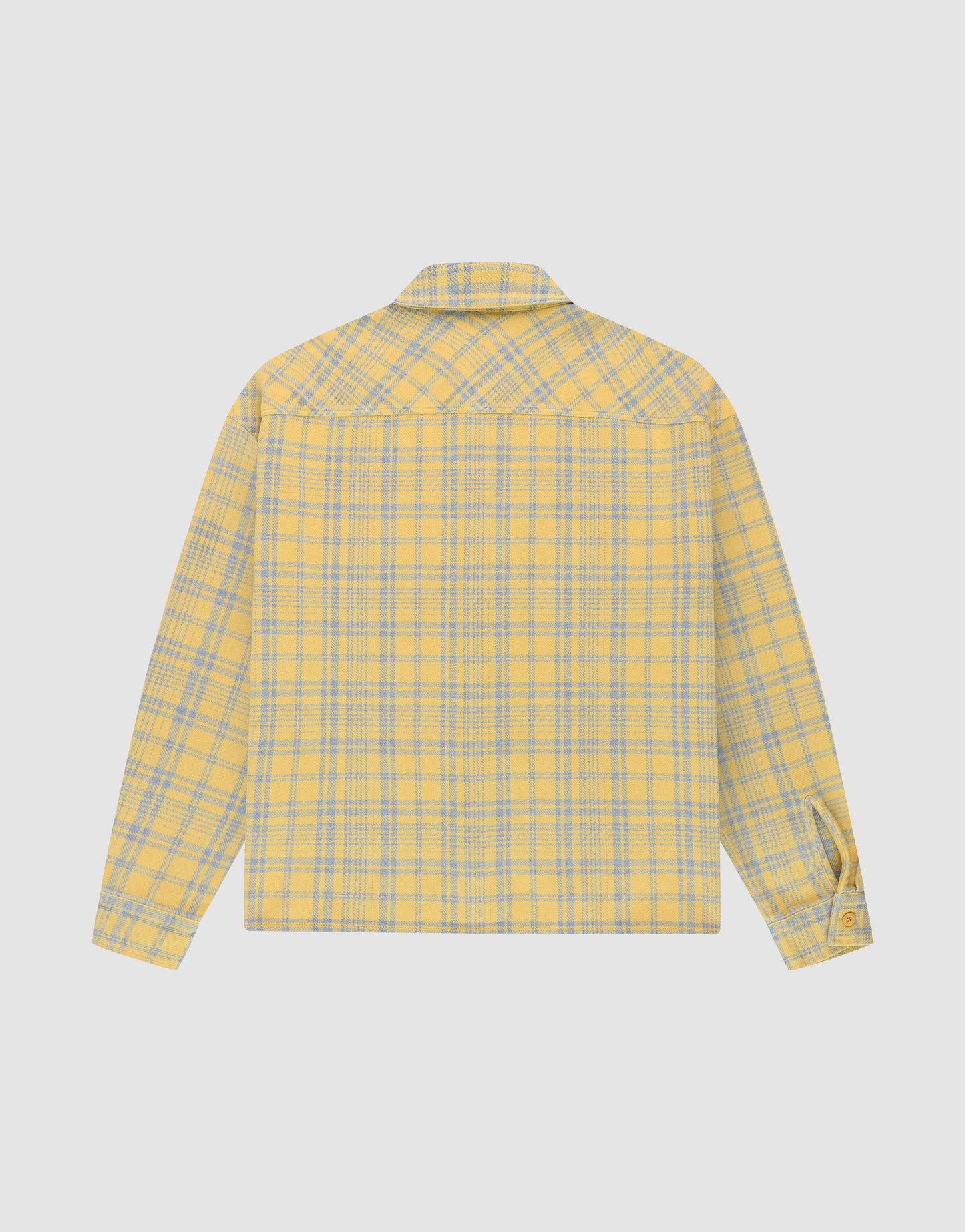LIVE FAST DIE YOUNG Vintage Flannel in yellow and light blue plaid, oversize fit, shown from the back with one buttoned cuff, displayed on a plain white background.
