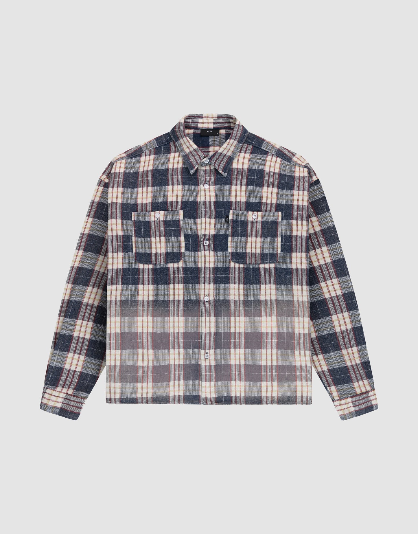 The LIVE FAST DIE YOUNG Vintage Flannel is an oversize, long-sleeve button-up with a Hemdkragen, two chest pockets, and a navy blue, white, and beige striped vintage Waschung pattern. Shirt shown laid flat on a light background.