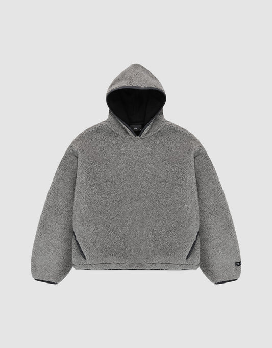 The LFDY Teddy Hooded by LIVE FAST DIE YOUNG is a gray, long-sleeve, oversized hoodie with soft fleece-like material and practical pockets, shown flat on a light gray background. | plain