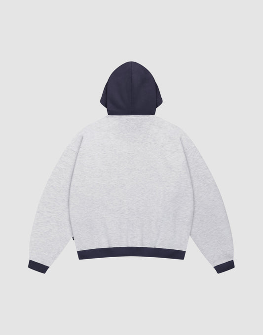 A back view of the LFDY District Hooded by LIVE FAST DIE YOUNG, an oversize fit hoodie in light gray with contrasting dark navy hood, waistband, and cuffs, laid flat on a white background.