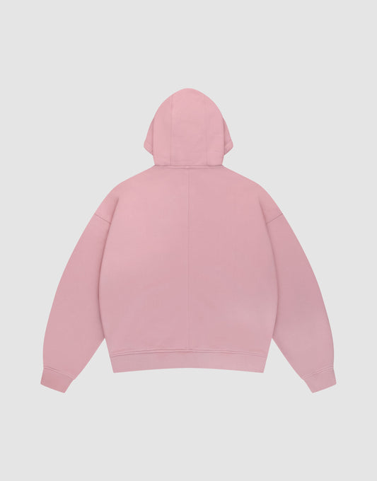 The LFDY Vandals Hooded Zip by LIVE FAST DIE YOUNG is displayed from the back, highlighting its long sleeves, oversize fit, and plain light pink color against a white background.