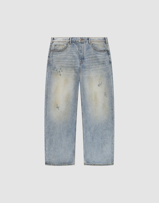 The LFDY Baggy Denim by LIVE FAST DIE YOUNG features a light blue, straight-leg baggy fit with faded and distressed detailing on the thighs and pockets, shown against a plain white background.| plain
