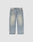 The LFDY Baggy Denim by LIVE FAST DIE YOUNG features a light blue, straight-leg baggy fit with faded and distressed detailing on the thighs and pockets, shown against a plain white background.