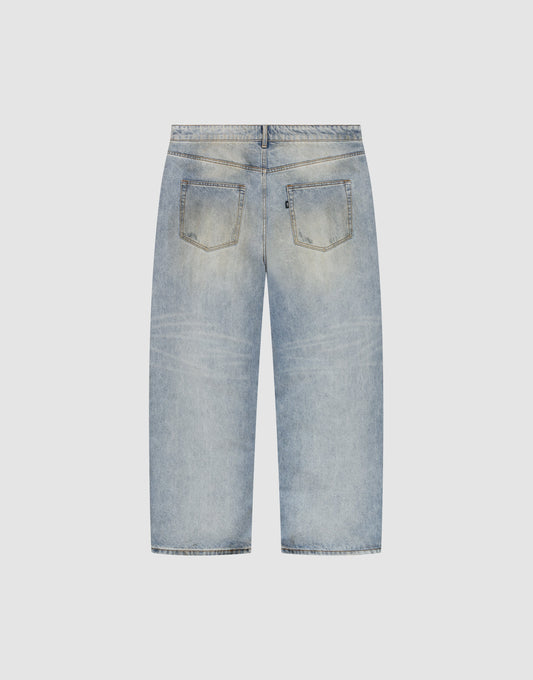 Back view of LIVE FAST DIE YOUNG’s LFDY Baggy Denim in light blue. These straight-leg jeans feature two back pockets, subtle fading, and a relaxed baggy fit, shown laid flat on a plain light background.