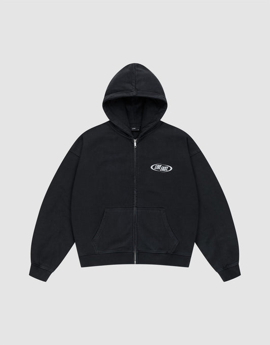 The LIVE FAST DIE YOUNG LFDY Canine Hooded Zip is a black oversized zip-up hoodie with a front pocket, small white OhFast logo on the left chest, and silver print, shown on a light gray background.