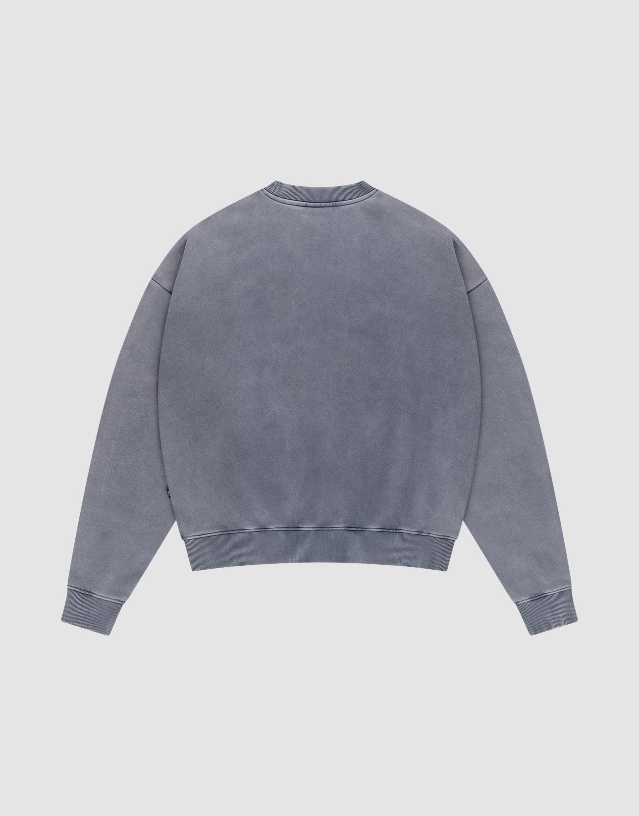 The LIVE FAST DIE YOUNG Basic Blank Sweater, a faded blue, long-sleeve crewneck with Vintage-Waschung, is shown laid flat with the back facing up on a light gray background.