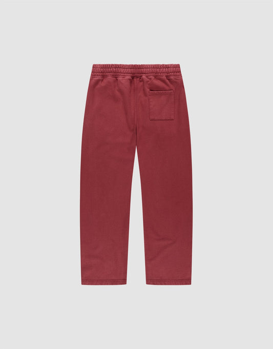 Back view of LIVE FAST DIE YOUNG’s Live Fast London Wide Jogger in red, featuring wide fit, breitem Elastikbund, single back pocket, and soft Baumwolle fabric, shown on a plain light gray background.