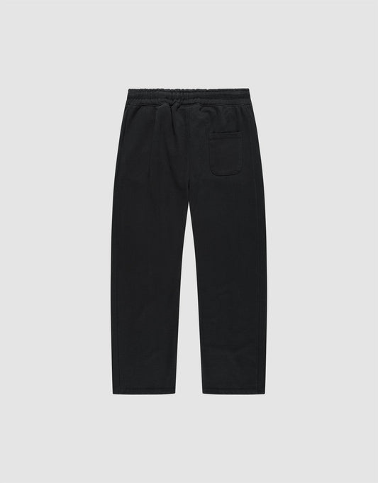 The Basic Wide Jogger by LIVE FAST DIE YOUNG features an elastic waistband, straight wide-fit legs, and a single back patch pocket, made from soft cotton and shown against a plain white background.