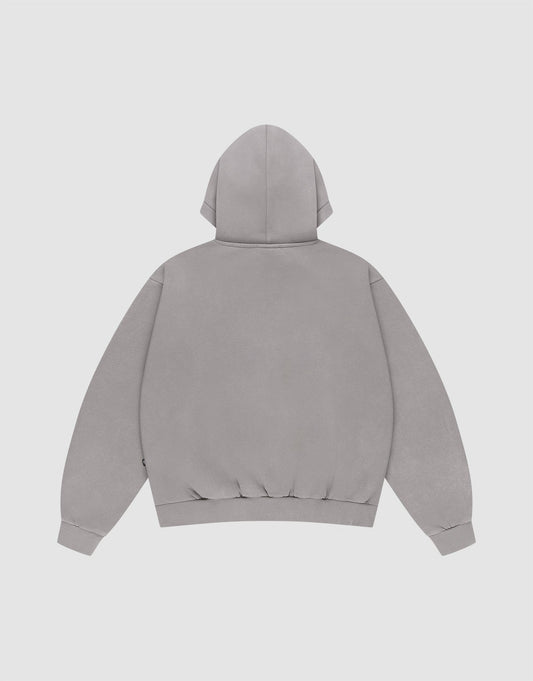 The LIVE FAST DIE YOUNG Basic Blank Hooded is a plain, light gray oversized hoodie with long sleeves, ribbed cuffs and hem, made from Baumwolle. Shown from the back against a white background.