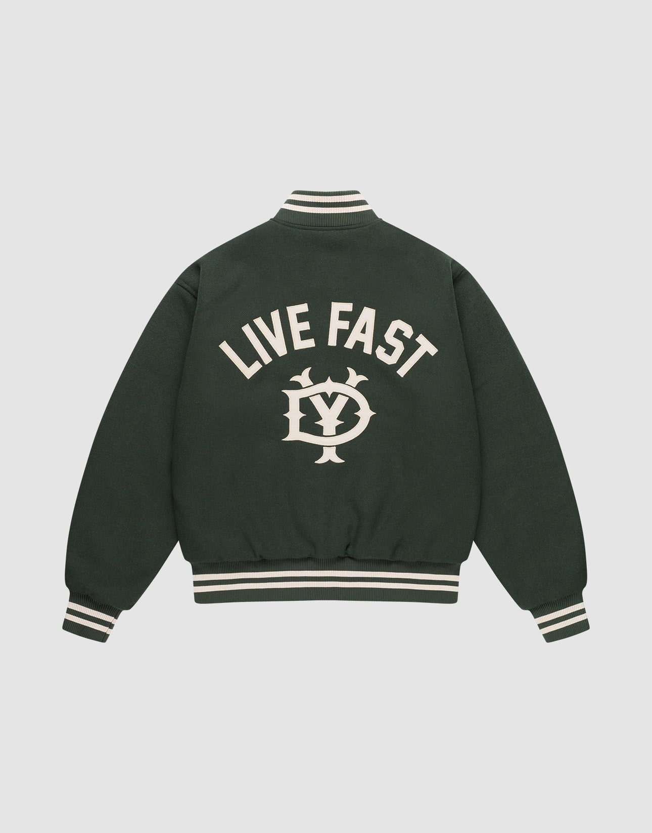 The LIVE FAST DIE YOUNG Live Fast College Jacket is dark green with a DY zipper, white striped cuffs and collar, and features large “LIVE FAST” text above an LV emblem on the back. Shown against a plain light background. | plain