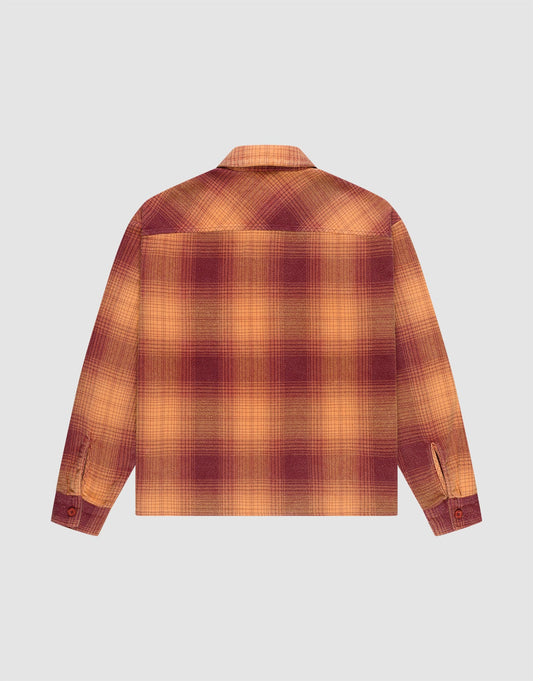 Back view of the LIVE FAST DIE YOUNG Vintage Flannel in Oversize Fit, showcasing an orange-red plaid long-sleeve design with buttoned cuffs and a straight hem against a plain light gray background.
