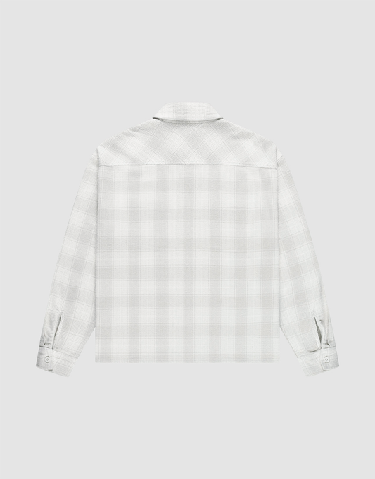 A back view of the LIVE FAST DIE YOUNG Vintage Flannel in light gray and white plaid, featuring an oversize fit and buttoned cuffs, displayed against a plain white background.