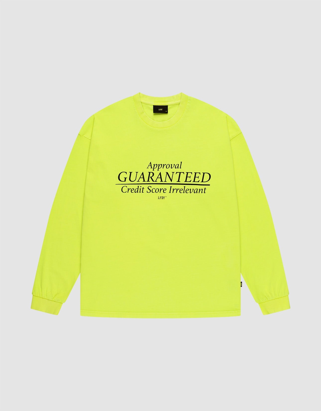 The LFDY Real Est.8 Longsleeve by LIVE FAST DIE YOUNG is a neon yellow, 100% cotton oversize fit shirt with black front and back print: "Approval GUARANTEED Credit Score Irrelevant LFTF," shown laid flat on a white background.