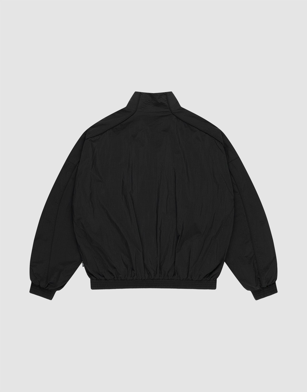 The LFDY Dealership Trackjacket by LIVE FAST DIE YOUNG is a black, long-sleeve jacket with Stehkragen, elastic waistband and cuffs, and a Regular Fit, shown from the back on a plain light gray background.