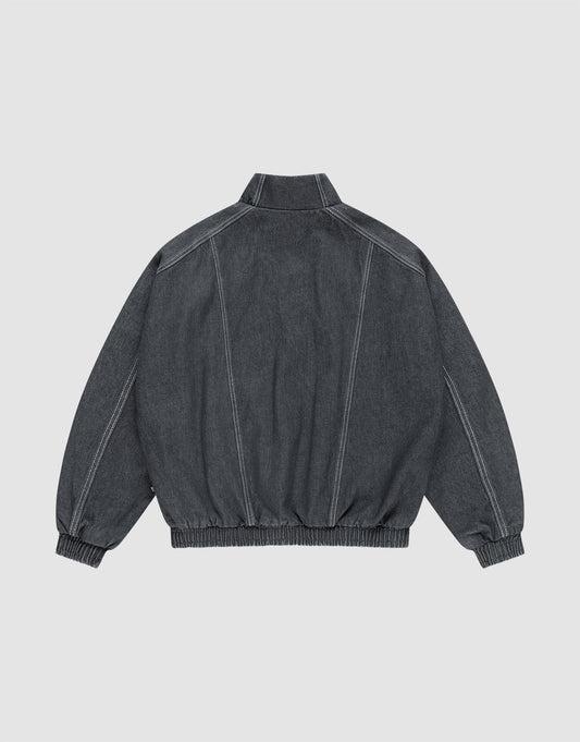 The LFDY Denim Trackjacket by LIVE FAST DIE YOUNG is a dark gray 100% Baumwolle jacket, shown from the back with prominent white stitching, Stehkragen, and elasticated cuffs and waistband.