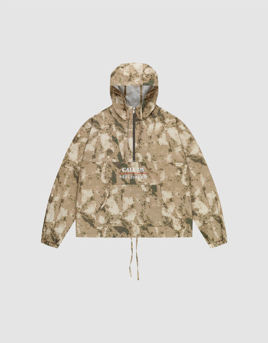 The LFDY Camo Halfzip Jacket by LIVE FAST DIE YOUNG is an oversized beige and brown camouflage hooded jacket, made from 100% Baumwolle, featuring a front pocket, drawstring hem, and "CALL US WILDNESS" in white on the chest. | plain