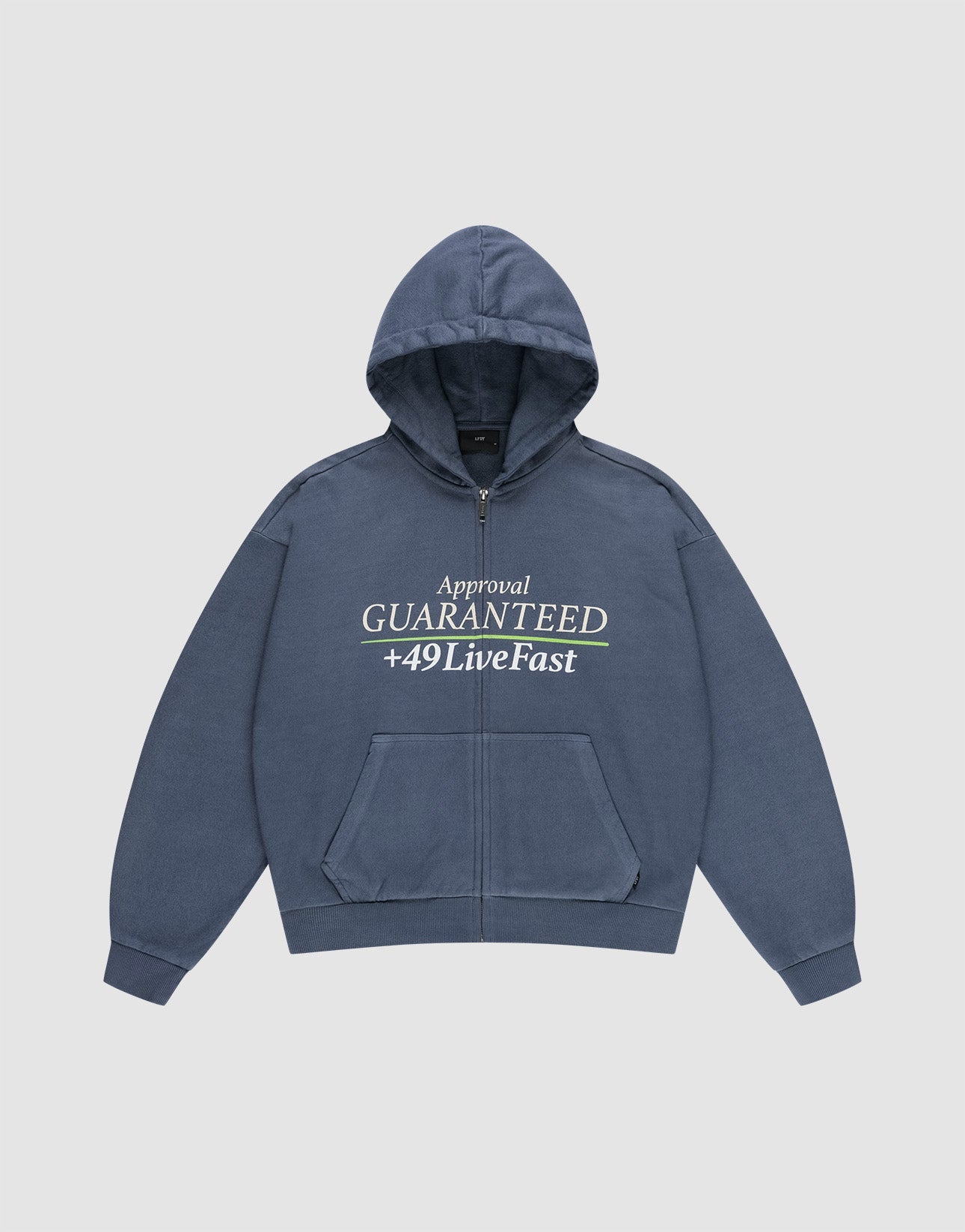 The LFDY Guaranteed Hooded Zip by LIVE FAST DIE YOUNG is a blue oversized zip-up hoodie with front pockets, featuring a bold front print reading "Approval GUARANTEED +49LiveFast," and made from 100% Baumwolle for comfort. | plain