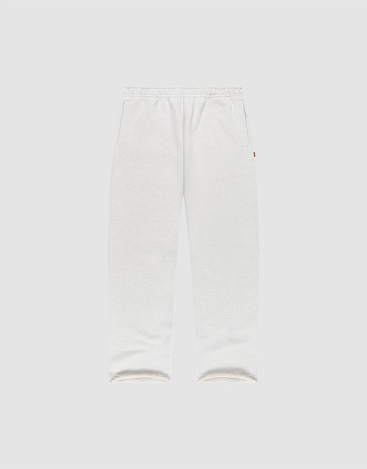 LIVE FAST DIE YOUNG LFDY Heavyweight Loungepants in white wide fit, made from 650gsm Baumwolle with elastic waistband and side pockets, shown flat on a plain light gray background. | plain