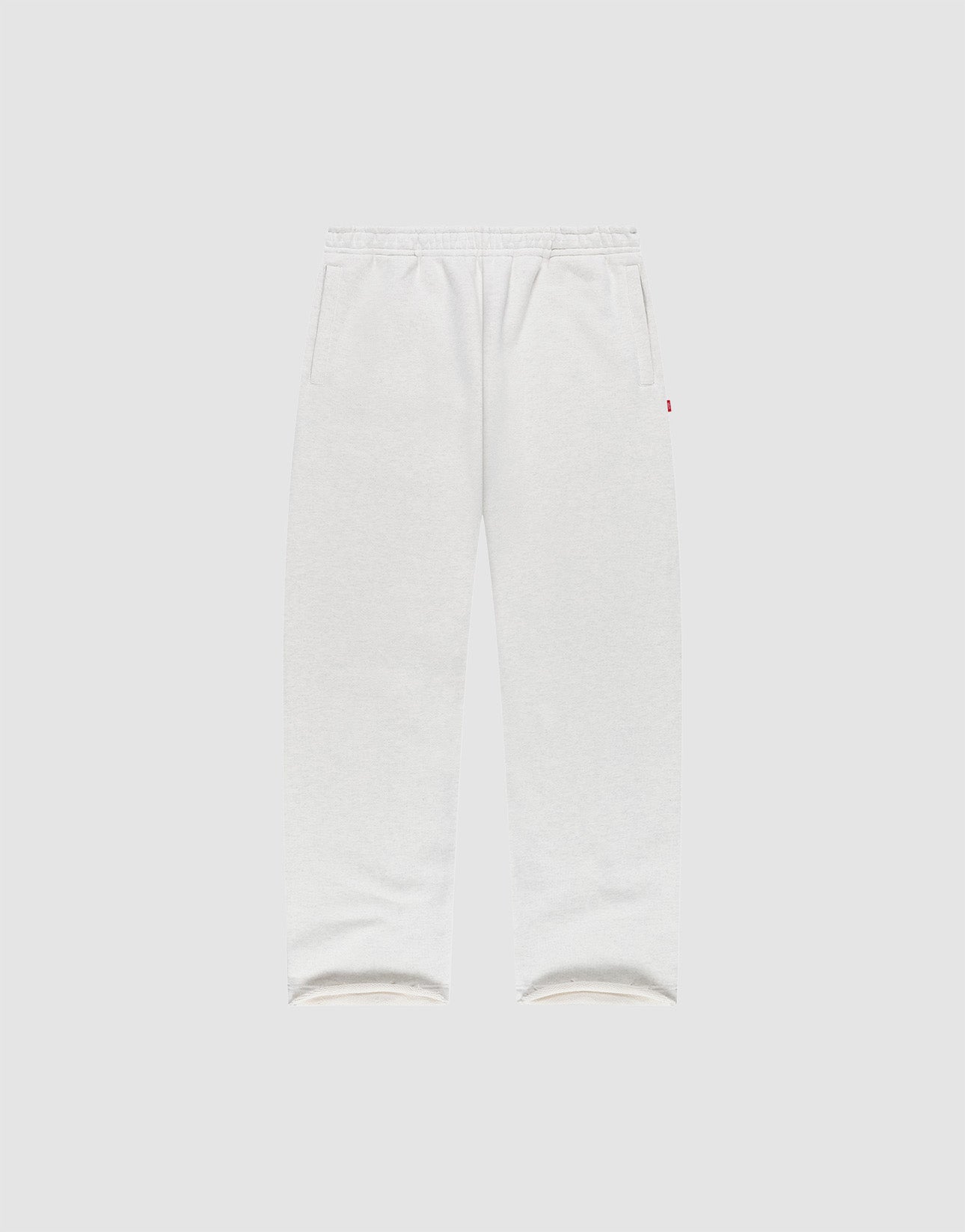 LIVE FAST DIE YOUNG LFDY Heavyweight Loungepants in white wide fit, made from 650gsm Baumwolle with elastic waistband and side pockets, shown flat on a plain light gray background.