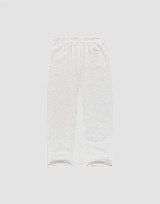The LFDY Heavyweight Loungepants by LIVE FAST DIE YOUNG are shown in white on a light gray background, featuring a 650gsm fabric, wide fit, elastic waistband, single right back pocket, and straight legs for lasting comfort.