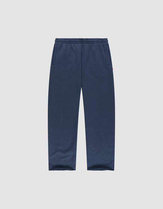 LIVE FAST DIE YOUNG LFDY Heavyweight Loungepants in navy blue, made from 650gsm 100% Baumwolle, feature an elastic waistband and side pockets, shown laid flat on a plain light gray background. | plain