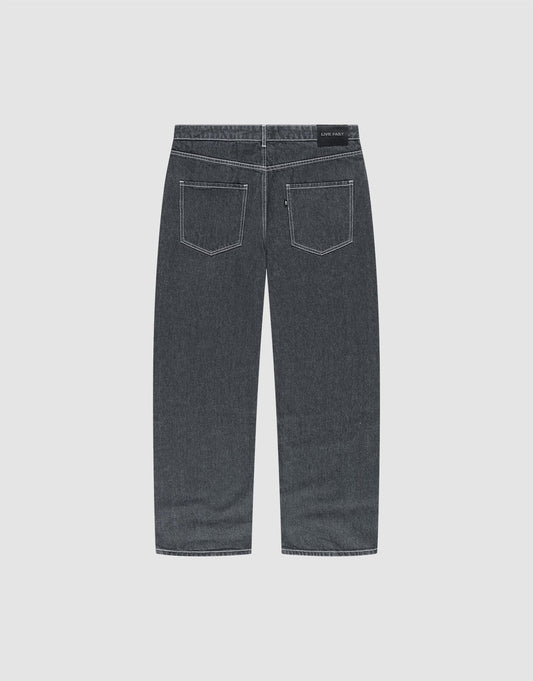 Back view of LFDY Baggy Denim by LIVE FAST DIE YOUNG in dark gray with two back pockets and white stitching, laid flat on a light background. Made from 100% Baumwolle for comfort and durability.