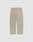 LIVE FAST DIE YOUNG Baggy Nylon Pants in beige, featuring a wide fit, elastic waistband, and two back patch pockets, shown flat on a plain light gray background.