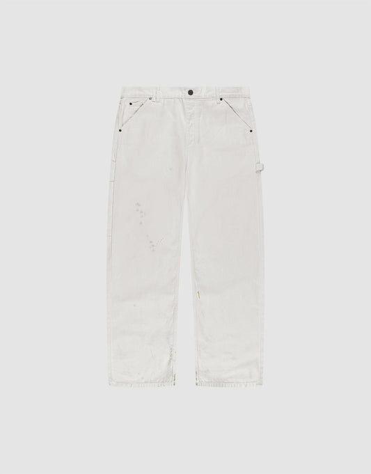 LIVE FAST DIE YOUNG Worker Pants shown flat on a light gray background. These white denim carpenter pants feature a baggy fit, straight legs, subtle distressing, side carpenter pockets, hammer loop, and are made from 100% Baumwolle. | plain