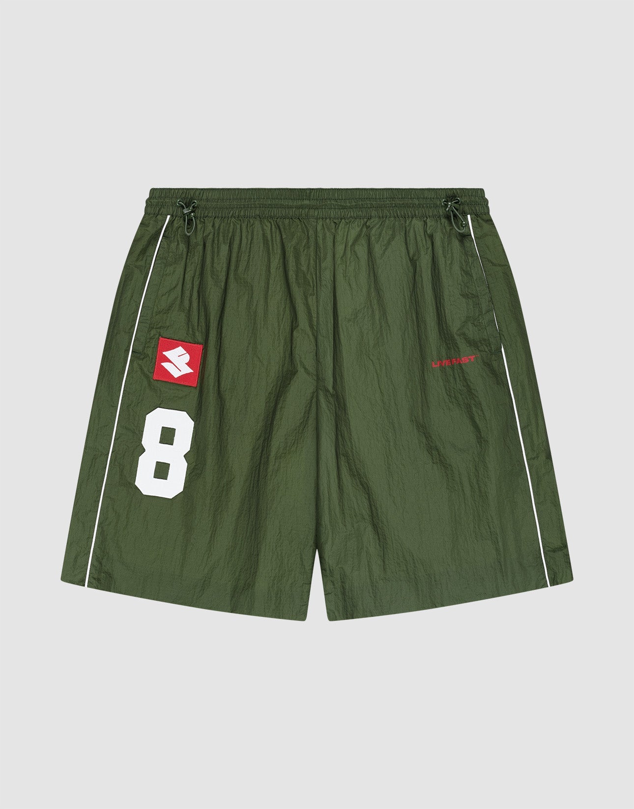 The LFDY Nylon Trackshorts by LIVE FAST DIE YOUNG feature a wide fit, elastic waistband, green polyamid fabric, white piping, number 8 and logo patch, plus bold red "LIBERTY" text on the right leg for sporty style and active comfort. | plain