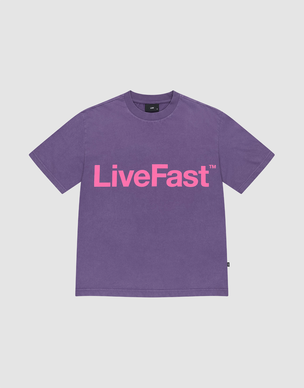 The Basic OS Livefast Tee by LIVE FAST DIE YOUNG is a purple t-shirt with a bold Frontprint: LiveFast™ in large pink letters. Made from 100% Baumwolle, it features short sleeves and a round neckline for all-day comfort. | plain