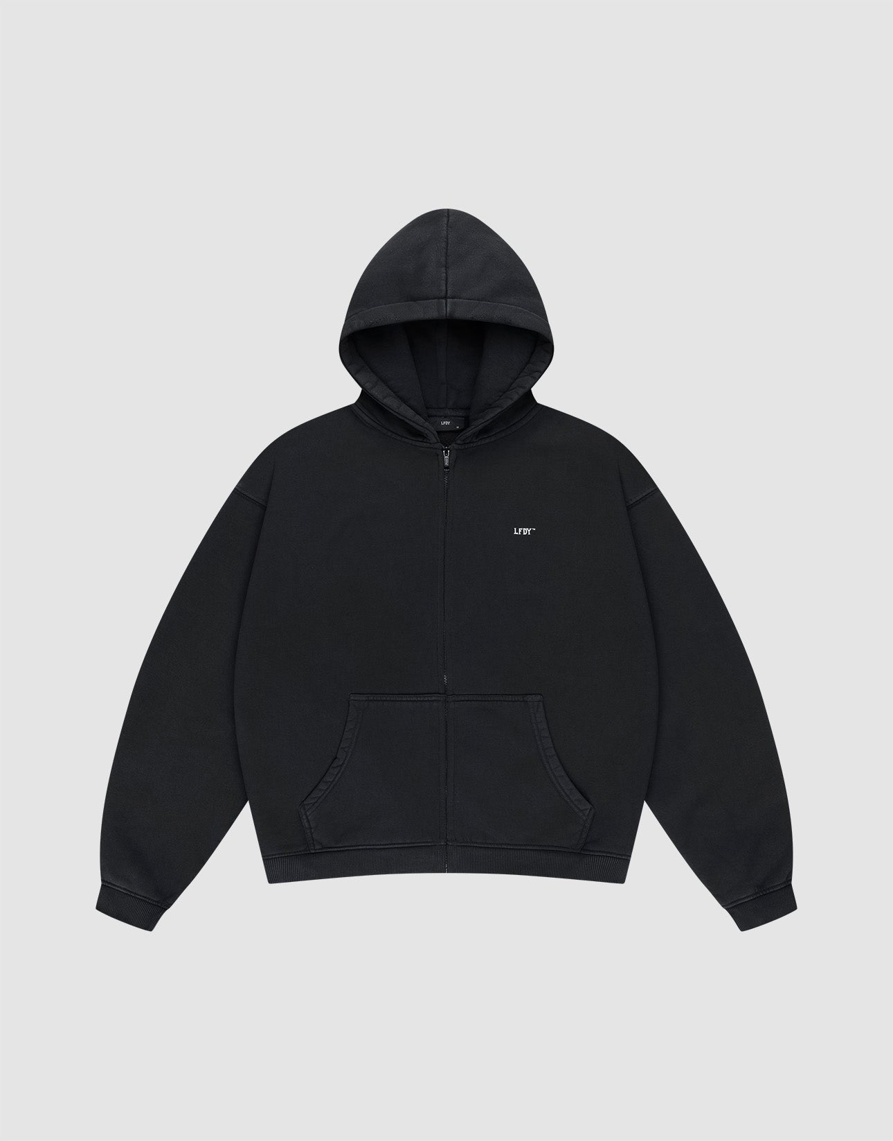 The Basic Evidence Hooded Zip by LIVE FAST DIE YOUNG is a plain black oversized zip-up hoodie with front pockets, a hood, and small white LIFT text on the left chest, shown against a light gray background.