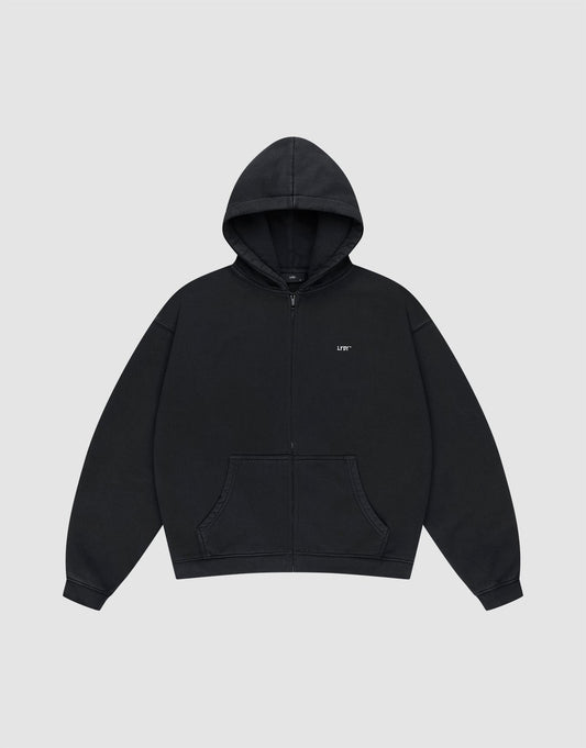 The Basic Evidence Hooded Zip by LIVE FAST DIE YOUNG is a plain black oversized zip-up hoodie with front pockets, a hood, and small white LIFT text on the left chest, shown against a light gray background.