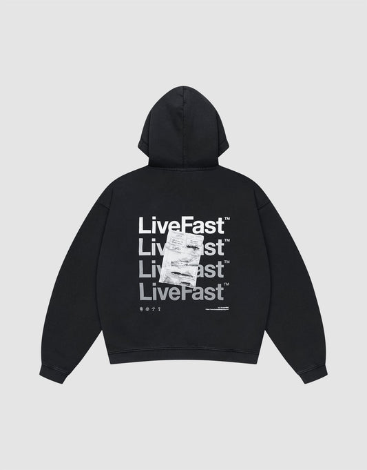 The LIVE FAST DIE YOUNG Basic Evidence Hooded Zip is a black oversized hoodie with repeated white "LiveFast™" and LFDY branding on the back, layered with a printed receipt graphic. Features a zip front and classic hood up style. | plain
