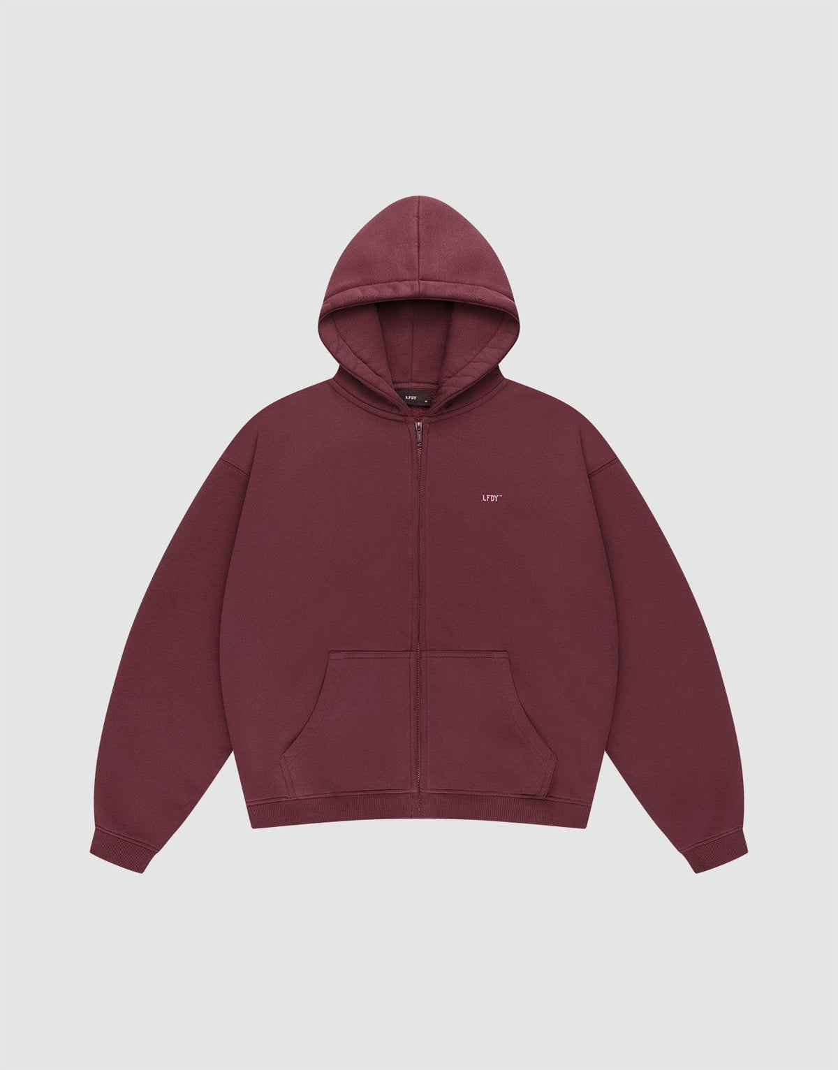 The Basic Hooded Zip by LIVE FAST DIE YOUNG is a maroon zip-up hoodie with a hood, front pockets, and small white LFDY branding on the left chest, shown on a plain light gray background. | plain