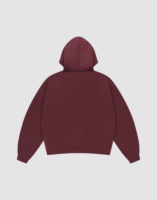 A Basic Hooded Zip by LIVE FAST DIE YOUNG in plain maroon is laid flat, back facing up, with long sleeves, a hood, and no visible logos or designs on a light gray background.