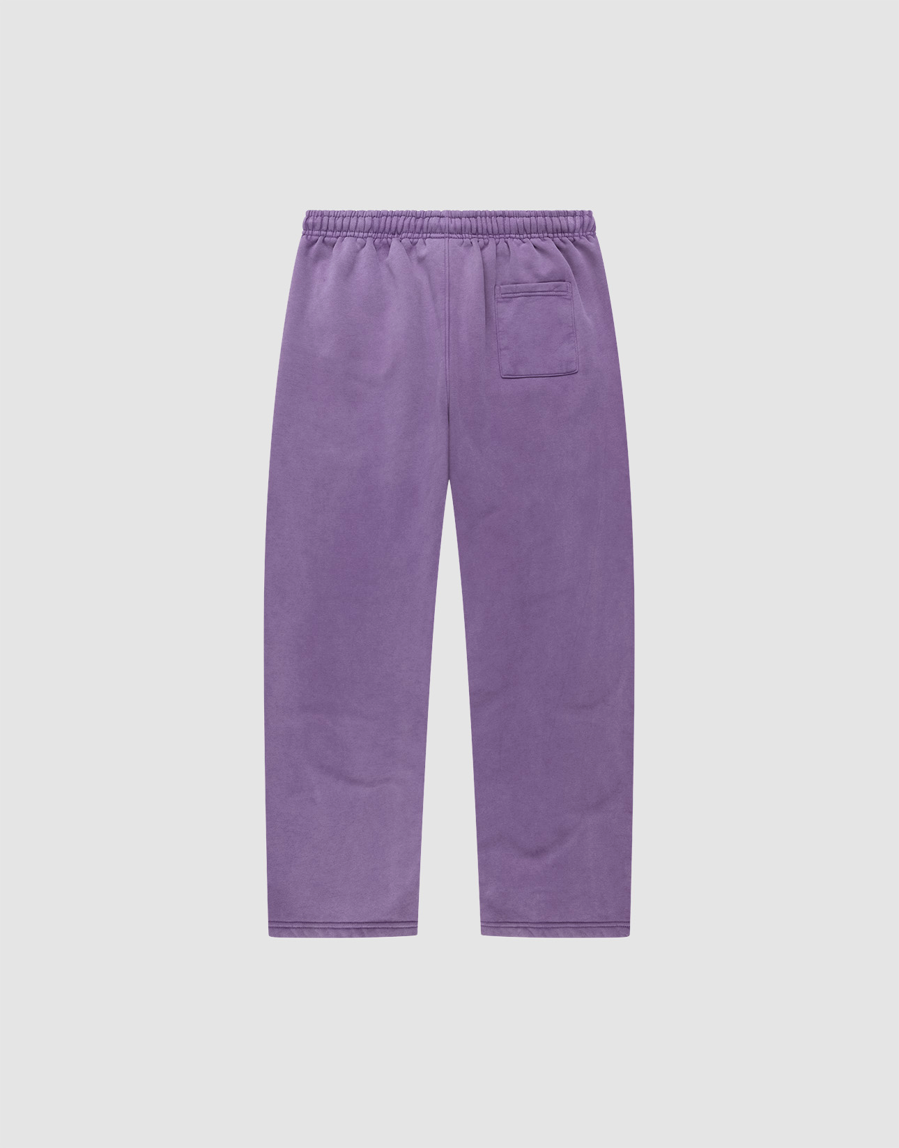 The LIVE FAST DIE YOUNG Basic Wide Jogger features a wide fit, elastic waistband, logo-print detail, and a single back pocket. Displayed flat on a plain white background.