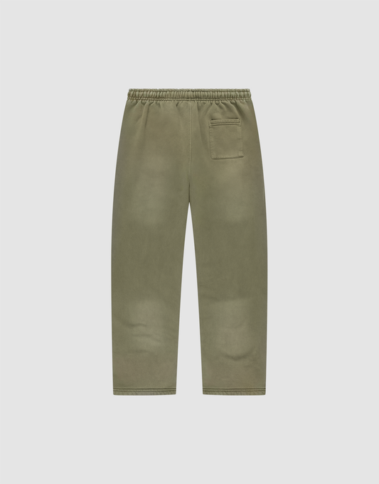 The LIVE FAST DIE YOUNG Basic Wide Jogger is an olive green, wide fit straight-leg pant with an elastic waistband, single back pocket, and subtle faded look, shown flat against a plain white background.