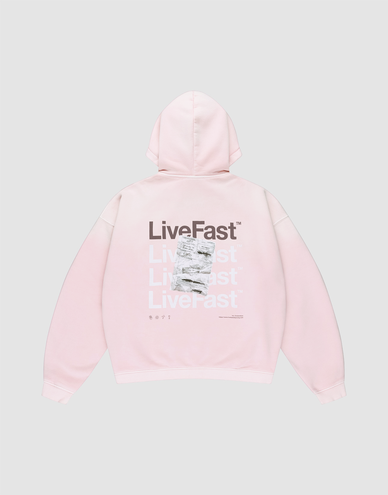 The Basic Evidence Hooded Zip by LIVE FAST DIE YOUNG is a light pink oversized hoodie with “LiveFast” in white and gray on the back, black “LiveFast” at the top, LFDY branding, and a crumpled graphic layered over part of the text. | plain