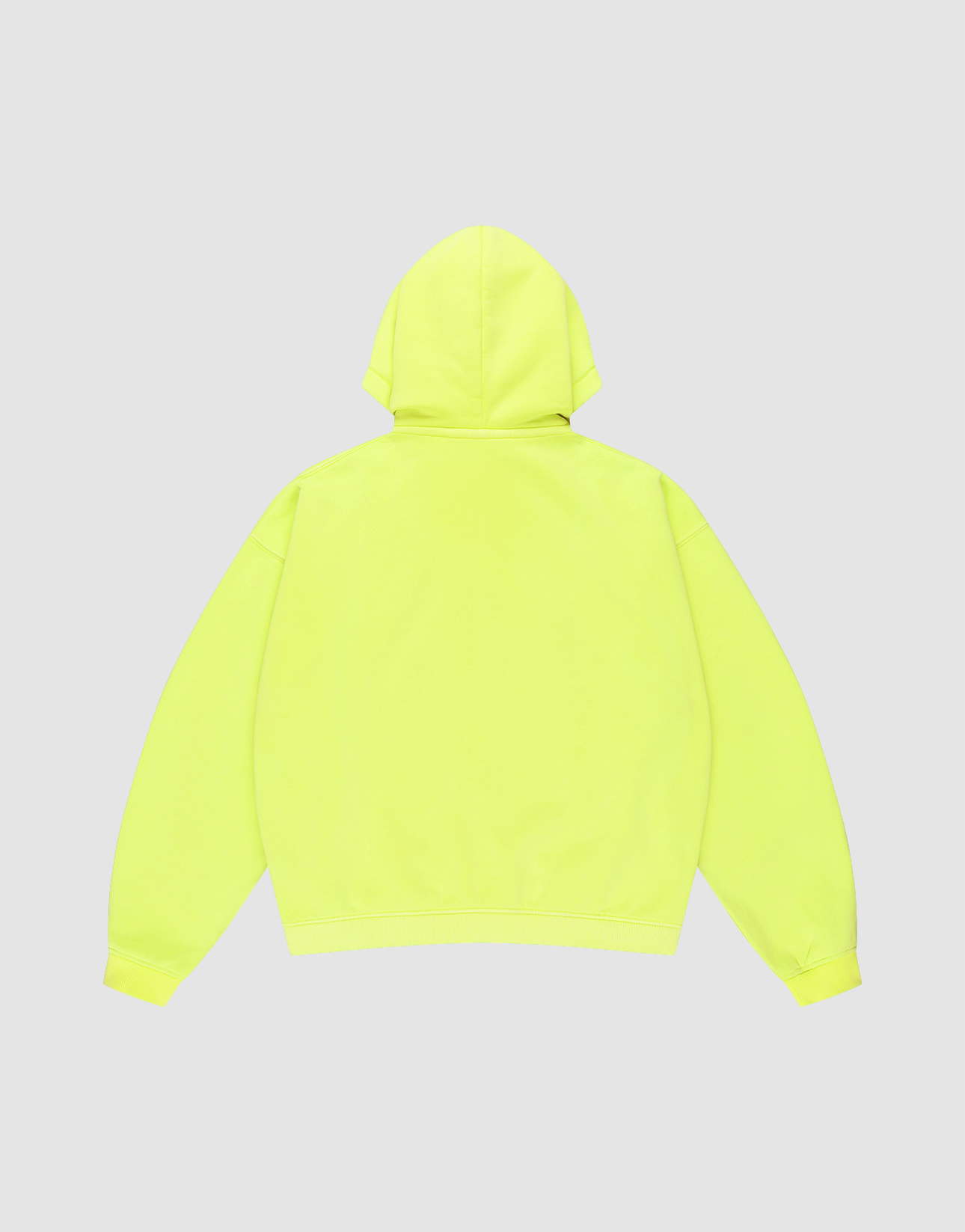 The LIVE FAST DIE YOUNG Basic Hooded Zip in bright yellow is shown from the back on a light gray background, featuring an oversize fit, long sleeves, ribbed cuffs and hem, and bold brand detailing.