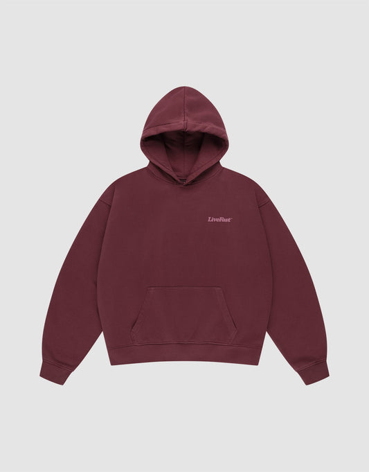 The Basic 360 Hooded by LIVE FAST DIE YOUNG is a maroon cotton hoodie with a front pocket, small "LiveFast" text on the left chest, and an oversize fit, shown against a plain light gray background.