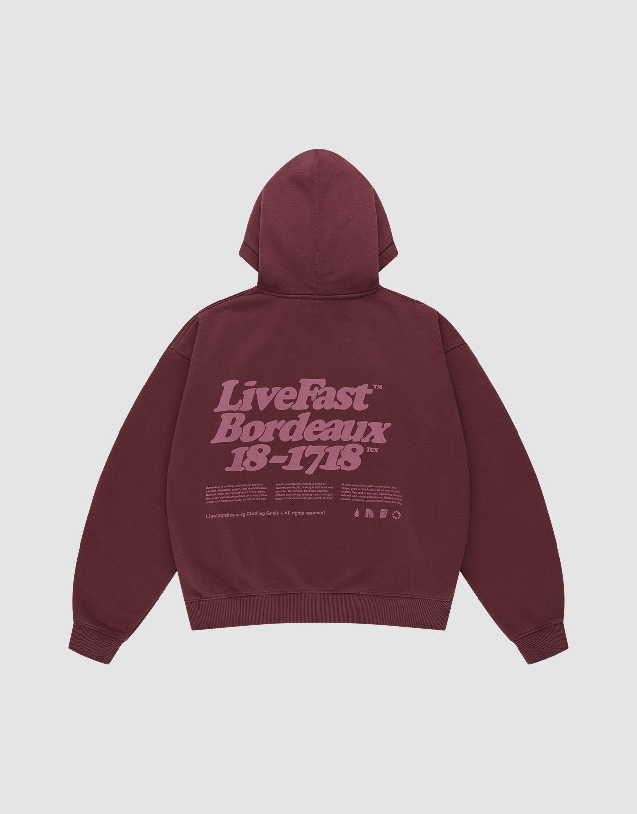 The LIVE FAST DIE YOUNG Basic 360 Hooded is a maroon oversized cotton hoodie with a hood, front and back prints including a large light purple "LiveFast Bordeaux 18-1718" text and small symbols on the back. | plain