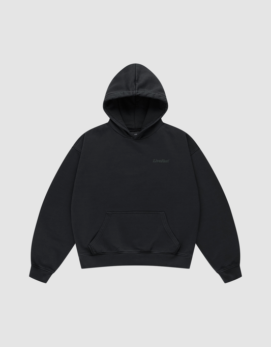 The LIVE FAST DIE YOUNG Basic 360 Hooded is a black cotton oversize fit sweatshirt with long sleeves and a front pocket, shown on a light gray background.