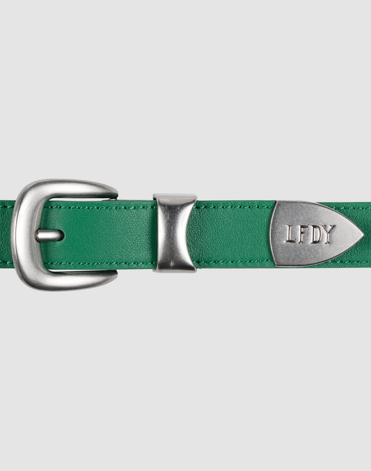 The LFDY Slim Belt by LIVE FAST DIE YOUNG is a green Leder belt (LF2606-20551) with a silver engraved LFDY buckle and tip, shown on a light gray background. Its Gesamtlänge makes it easy to style with any outfit. | model