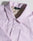 A close-up of the LIVE FAST DIE YOUNG LFDY Striped Padded Shirt in light pink and white stripes, featuring a folded collar, two pockets, and white buttons. This Herren Hemdjacke is neatly arranged on a light surface.