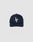 The LF Snapback by LIVE FAST DIE YOUNG is a navy blue cotton baseball cap with a large white LF embroidered in front and a small logo on the side, displayed against a plain light gray background.