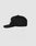 The Live Fast Unstructured Cap by LIVE FAST DIE YOUNG is a black baseball cap with a curved brim, side view, and white embroidered front text. Features include Mit Snapverschluss and a Flag Label, shown against a light gray background.