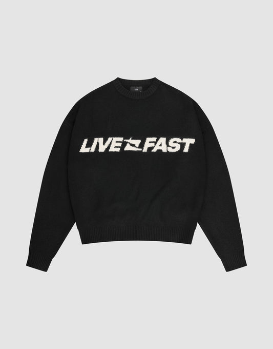 The Live Fast Boucle Sweater by LIVE FAST DIE YOUNG is a black oversized crewneck with "LIVE FAST" in bold white lettering across the chest. | plain